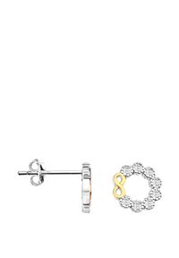 Silver studs i formen av en cirkulär blomma, med en oändlighetssymbol i gult guld och små klara stenar runt kanten.