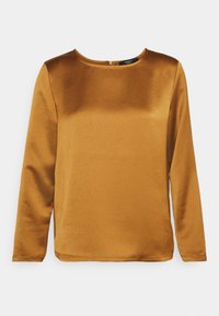 Langærmet top i en gyldenbrun nuance, lavet af glat satinmateriale, med rund halsudskæring og en diskret lynlås på ryggen.