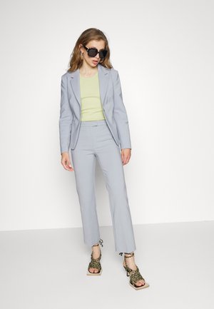 NOORA - Pantalon classique - tradewinds