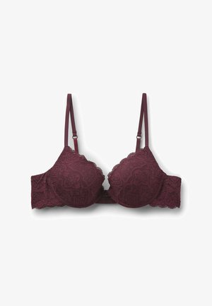 Sujetador de encaje en un profundo color burdeos con bordes festoneados. Tirantes ajustables y detalle de patrón floral intrincado en las copas. Ligeramente acolchado.