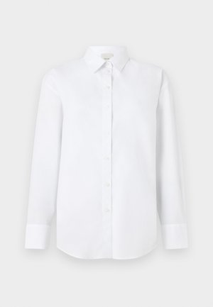 Witte lange mouwen shirt van gladde stof, met een knoopsluiting aan de voorkant, klassieke kraag en afgeronde zoom met geknoopte manchetten.