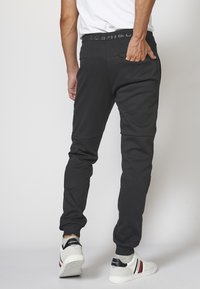 Koroshi JOGGING - Trainingsbroek - black