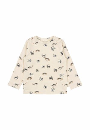 Chemise à manches longues crème avec un motif de crabes répété en différentes couleurs. Matière en coton doux, avec un col rond et un ourlet simple.