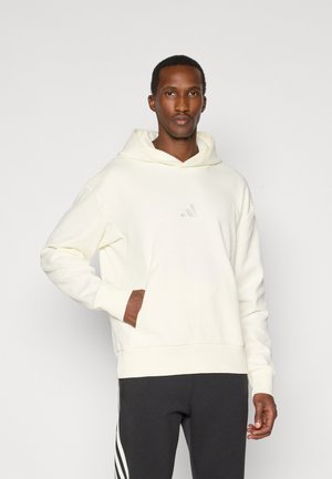Kapuutsiga pusa - off white
