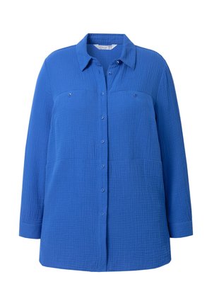 Camicia azzurra con bottoni, realizzata in tessuto texturizzato con un motivo a griglia, dotata di due tasche sul petto e maniche lunghe.