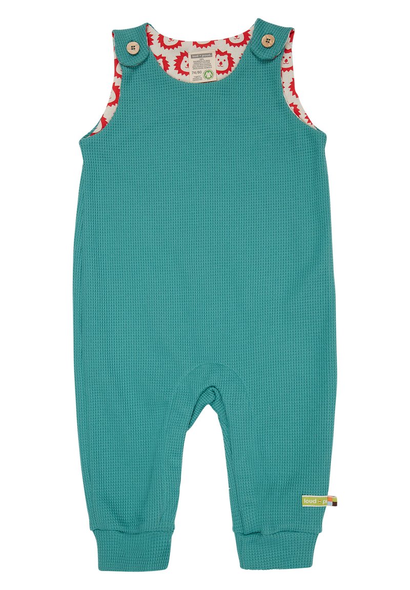 Salopette per toddler turchese in tessuto testurizzato con fodera a motivo di ricci rossi. Caratterizzata da bottoni di legno e polsini elastici alle caviglie.