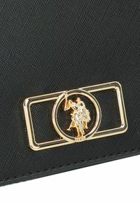 U.S. Polo Assn. - Kopertówka