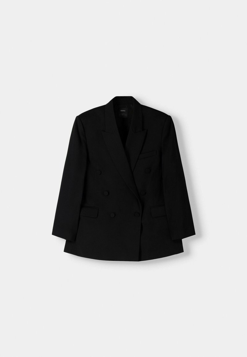 Blazer noir à double boutonnage avec revers crantés, deux poches avant et fermetures à bouton ; fabriqué à partir d'un tissu texturé.