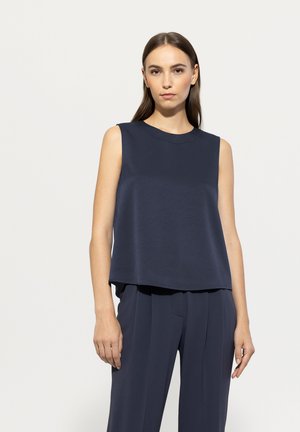 Marineblaue ärmellose Bluse mit rundem Ausschnitt, aus glattem Stoff gefertigt, mit lockerer Passform und leicht verkürztem Saum.