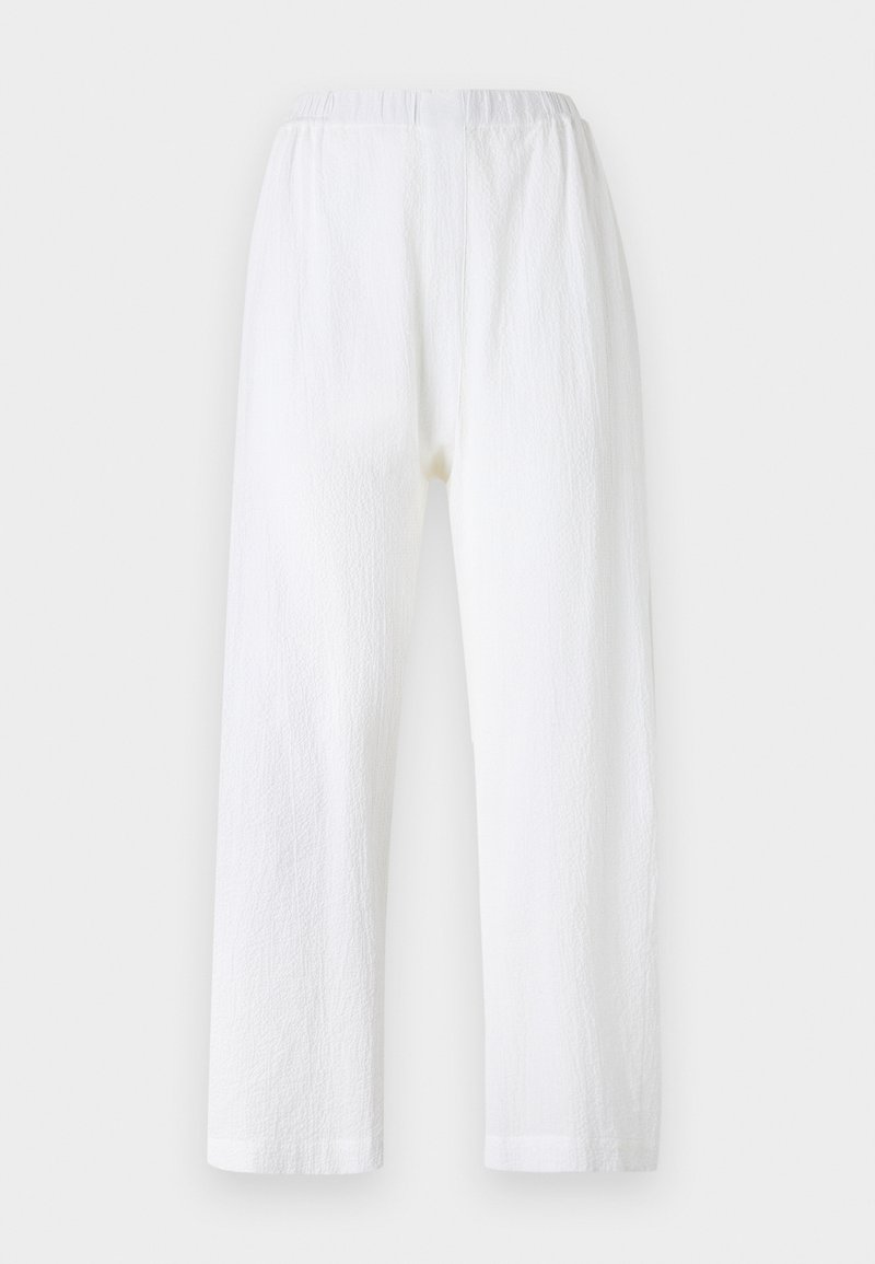 Weiße, lockere Hosen mit einem elastischen Bund, hergestellt aus strukturiertem Stoff. Gerades Bein Design mit einfachen gesäumten Säumen.