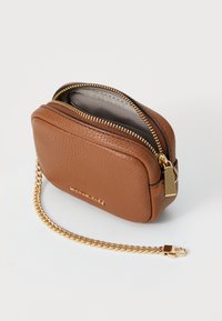 Brown textured leather pouch with gold-tone hardware, a top zipper, and a gold chain strap. Interior features a light gray lining.