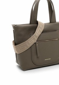 Dark grey leather handbag with textured finish, dual short handles, and a tan patterned shoulder strap. Features a front zip pocket.