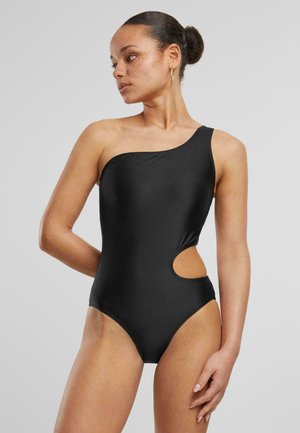 ASYMMETRIC CUT OUT - Bañador - black