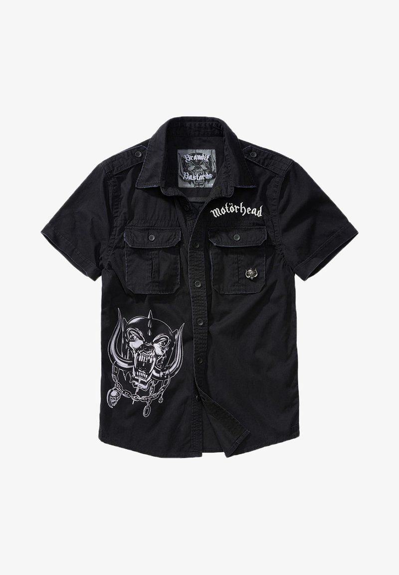 Zwarte T-shirt met korte mouwen, voorzien van twee voorzakken en een grote grafische print van een doodskop met een ketting. "Motörhead"-tekst op de borst.