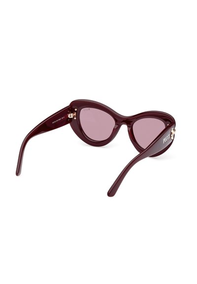 Burgundy plastic cat-eye sunglasses with tinted lenses, featuring gold-tone hardware on the outer arms and a glossy finish.