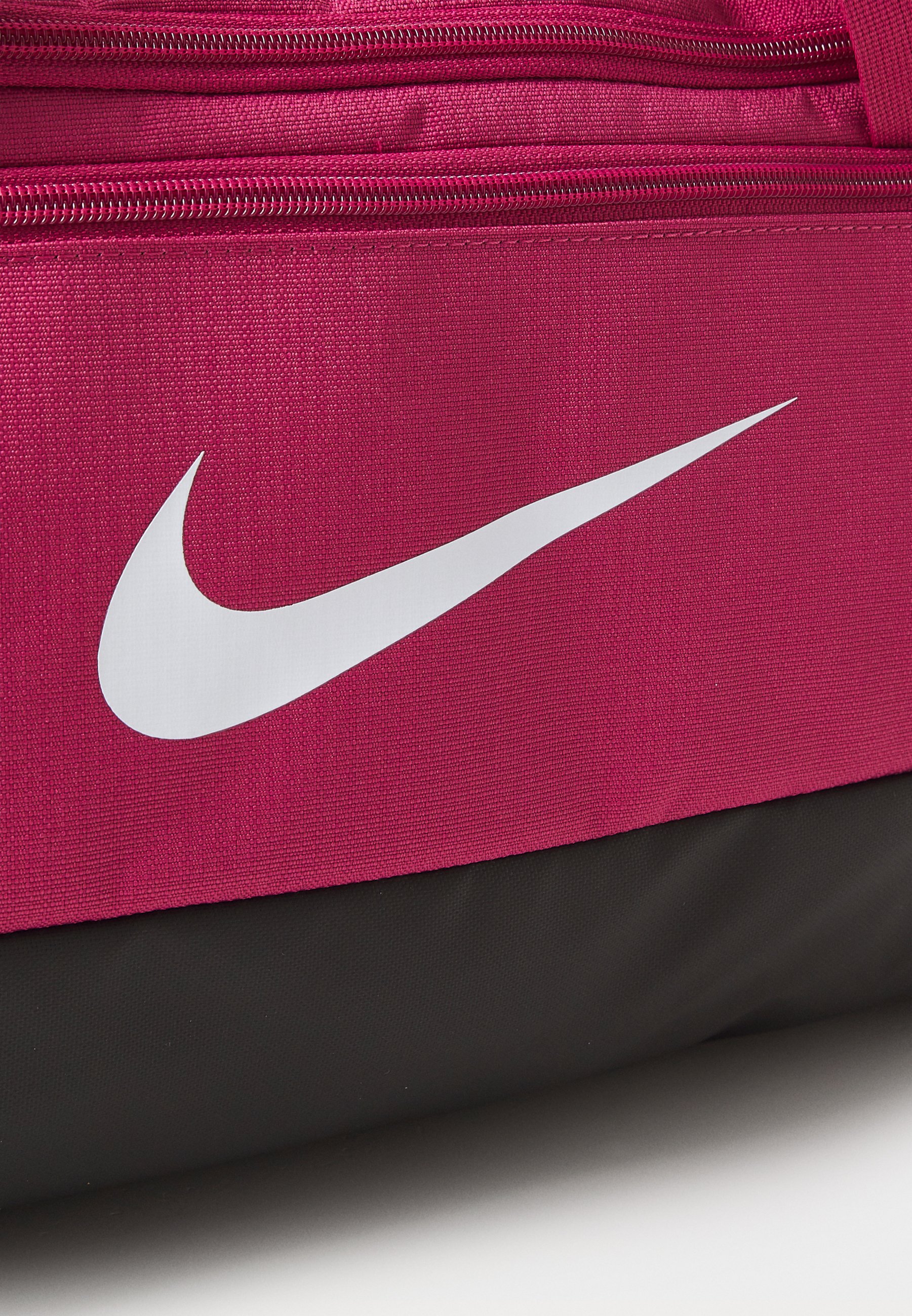 hot pink nike duffel bag