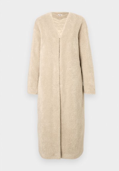Bézs színű, hosszú kabát puha, textúrált anyagból. V-nyakkivágású, elöl nyitott, hosszú ujjú és egyenes szabású.