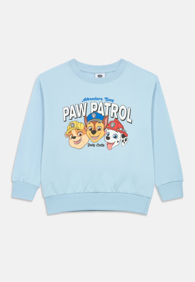 Felpa azzurra chiara in cotone, con una grafica che presenta tre personaggi canini a cartoni animati e la scritta "PAW PATROL". Polsini e orlo a costine.