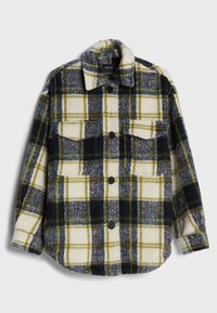 Fleece skjorta i kräm, svart, blå och gul rutig mönster; har två bröstfickor, knäppning och en mjuk textur.