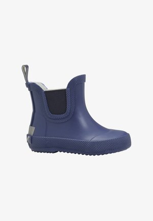 Marineblaue Gummistiefelette mit elastischen Seiteneinsätzen, strukturiertem Sohlenprofil und Schlaufen-Mehrweg-Tab. Glatte Oberfläche mit subtilen Mustern auf der Sohle.