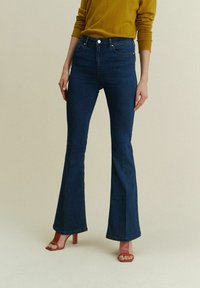 Next STRETCH  STANDARD - Flared Jeans - inky blue