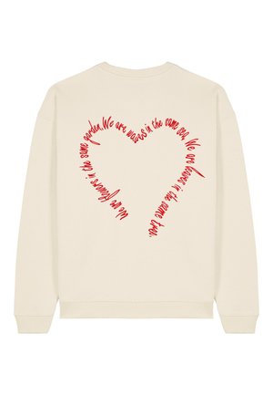 Felpa crema con grafica a forma di cuore rosso sul retro che presenta un testo scritto a mano. Materiale morbido, polsini e orlo a costine.