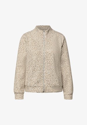 Veste matelassée beige avec un motif texturé, col montant, fermeture éclair à l'avant et poignets côtelés. Présente une coupe décontractée et une doublure lisse.
