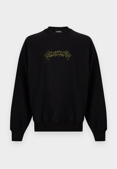 Μαύρο φούτερ με μακριά μανίκια και στρογγυλή λαιμόκοψη, με μικρό νεον κίτρινο γραφικό κείμενο στο κέντρο του στήθους.