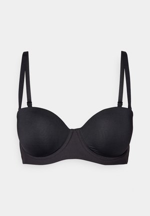 Black molded cup bra with adjustable thin straps, smooth fabric, and a seamless design. Features a classic underwire structure.