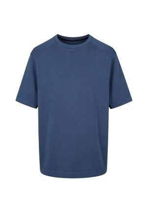 T-shirt a maniche corte con scollo tondo in blu navy tinta unita con un design semplice e senza cuciture su sfondo bianco.