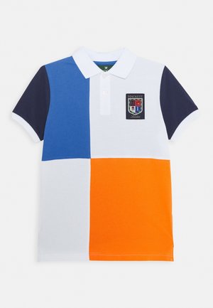 Polo à manches courtes avec des couleurs patchwork bleu, blanc, orange et marine, doté d’un col blanc et du blason Hackett London sur la poitrine.