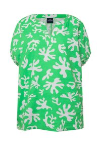 Top di lino verde con una vestibilità rilassata, caratterizzato da un motivo bianco simile a corallo, maniche corte e scollo a V.
