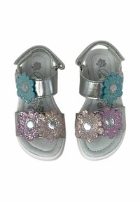 Sandali argento con cinturini regolabili, caratterizzati da tre applicazioni floreali glitterate nei toni del rosa e dell'azzurro, e una suola bianca imbottita.