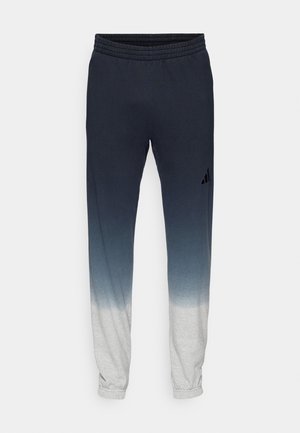 Sweatpants with a gradient design, transitioning from dark blue to light gray. Features an elastic waistband and a small black logo on the thigh.