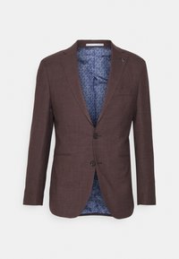 Blazer brun en tissu texturé avec deux boutons, revers crantés et doublure intérieure bleue à motifs. Poche poitrine unique et deux poches avant.