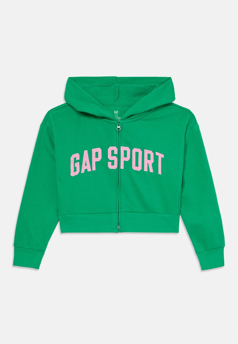 Zöld, pamutkeverék anyagból készült, cropped kapucnis pulóver, teljes cipzárral, fűzős kapucnival, amelyen a "GAP SPORT" felirat rózsaszínben található a mellkason.