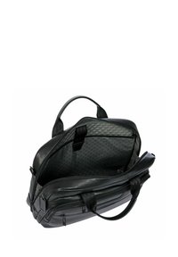 Sac en cuir noir avec fermeture éclair, double poignées et intérieur à motif hexagonal. Dispose de plusieurs compartiments pour le rangement.