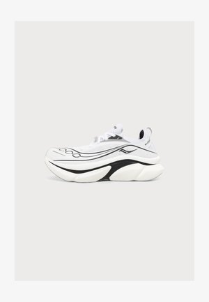 Zapatilla deportiva blanca con líneas onduladas negras, suela gruesa de varias capas, parte superior de malla y lengüeta en el talón sobre un fondo claro.