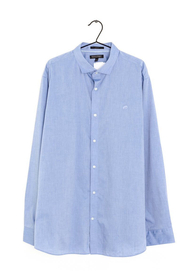 Light blue long-sleeve shirt, button-front, with a subtle pattern. Features a classic collar and a small logo on the left chest.