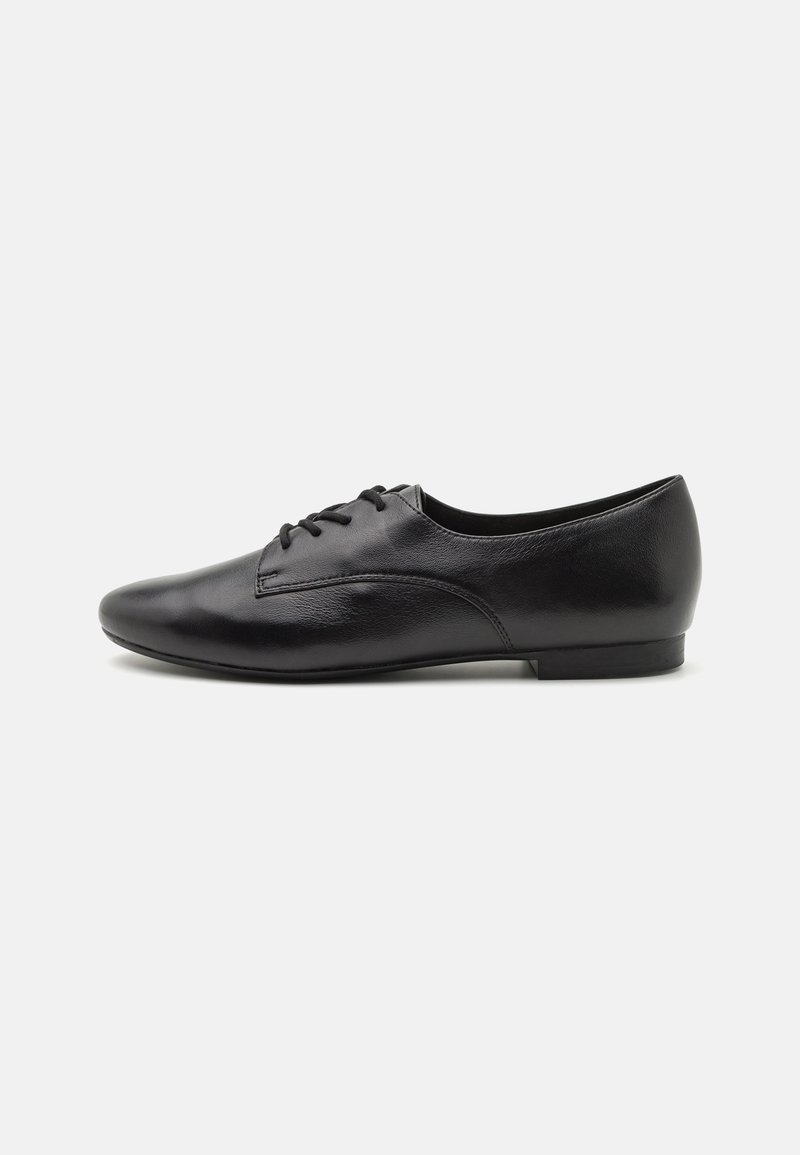 Black leather lace-up shoes with a smooth texture, rounded toe, low heel, and simple design. Side view emphasizing sleek shape and stitching.