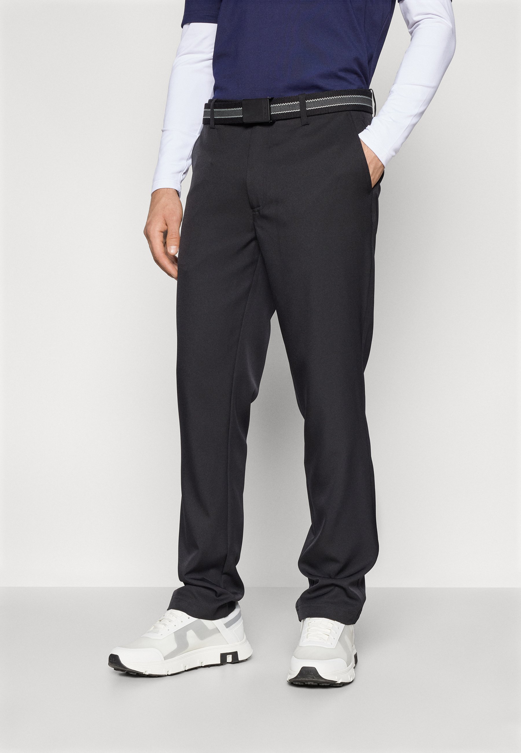 Calvin Klein Golf BULLET REGULAR FIT - Trousers - black - Zalando.ie