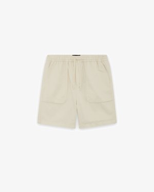 Pantaloncini casual beige con vita elastica, coulisse e due tasche applicate frontali, distesi su sfondo bianco.
