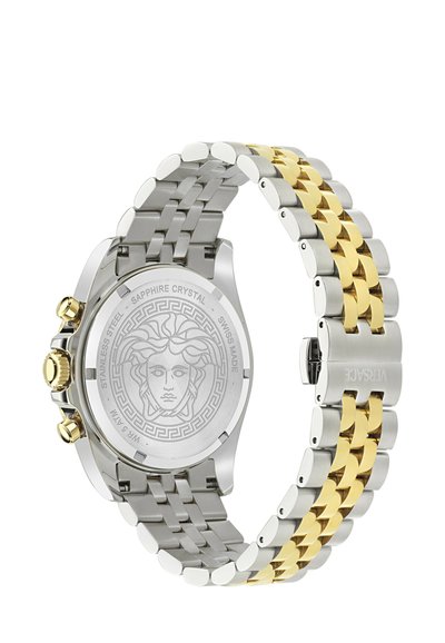 Roostevabast terasest ja kulla tooniga Versace käekell, mille tagapool on graveeritud Medusa embleem ning kahetooniline lingikell. 