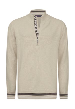 Helles beige Sweatshirt mit strukturiertem Muster, Viertelreißverschluss und geripptem Saum. Besitzt ein kontrastierendes Logodetail am Kragen.