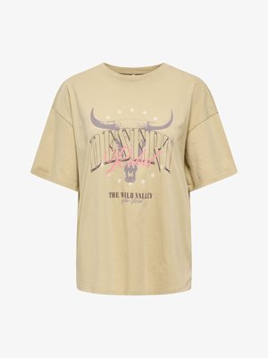 T-shirt beige oversize avec motif crâne de taureau, étoiles et textes "DESERT Rider" et "THE WILD VALLEY of the West" à l'avant.