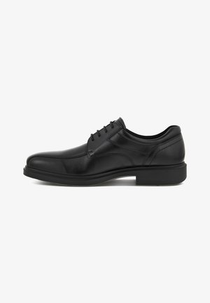 Chaussure habillée en cuir noir avec une finition lisse, design à lacets, bout rond et semelle en caoutchouc robuste. Détail de couture sur le côté visible.