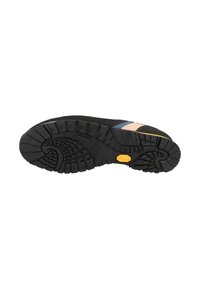 Black rubber sole with deep lugs for traction, featuring a beige and blue patterned upper section and a yellow accent on the midsole.