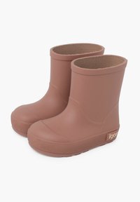 Bottes de pluie en caoutchouc roses avec un bout arrondi, surface lisse et semelle texturée. L'intérieur est doté d'une doublure en tissu marron et d'un accent de logo.