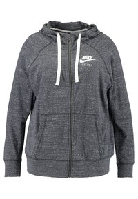 Tmavě šedá mikina na zip s bílými šnůrkami, předními kapsami a logem "Nike Just Do It" na levém hrudi. Měkká textilie.