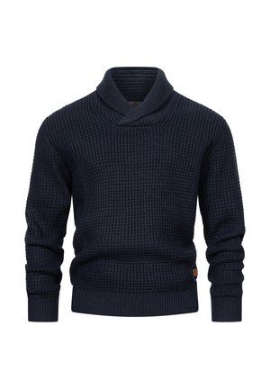 Suéter de punto azul marino con cuello chal, que presenta un patrón texturizado y puños acanalados. Detalle de logotipo de cuero pequeño en el dobladillo.